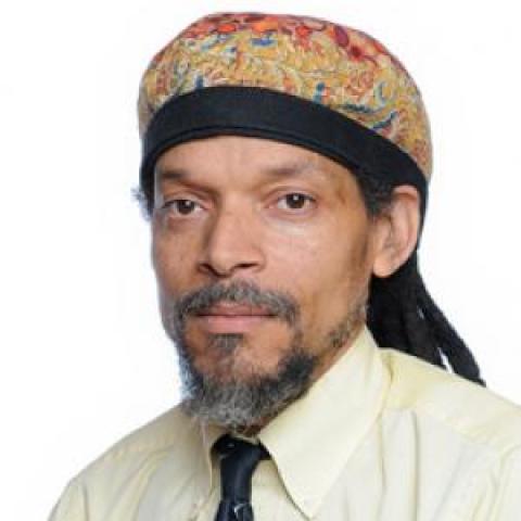 Profile headshot photo of Reginald Pointer.