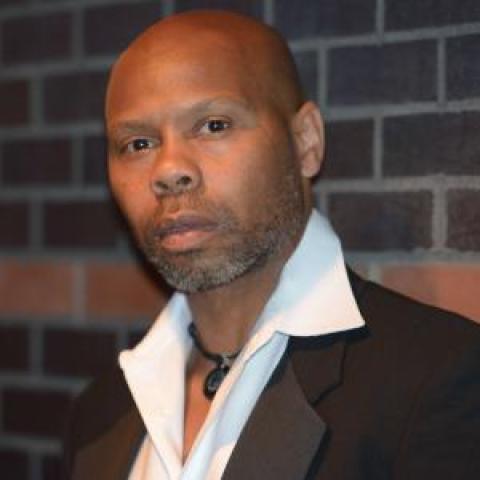 Profile headshot photo of Eric A Ruffin.