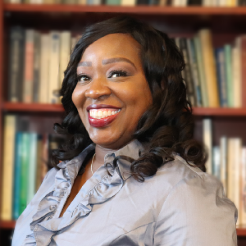 Profile headshot photo of Benita King.