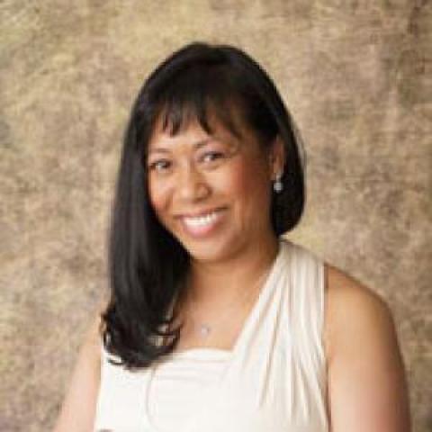 Profile headshot photo of Flordeliz T. Bugarin.