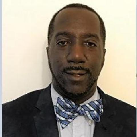 Profile headshot photo of Torrance P. Fennell.