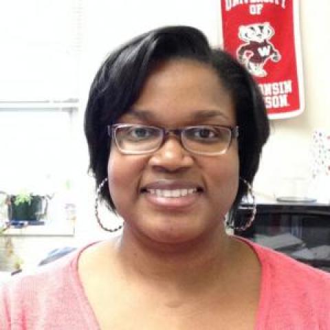 Profile headshot photo of Courtney J. Robinson.