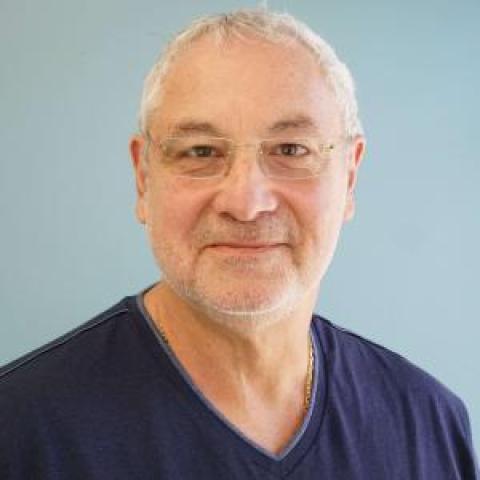 Profile headshot photo of Christos Loukaitis.