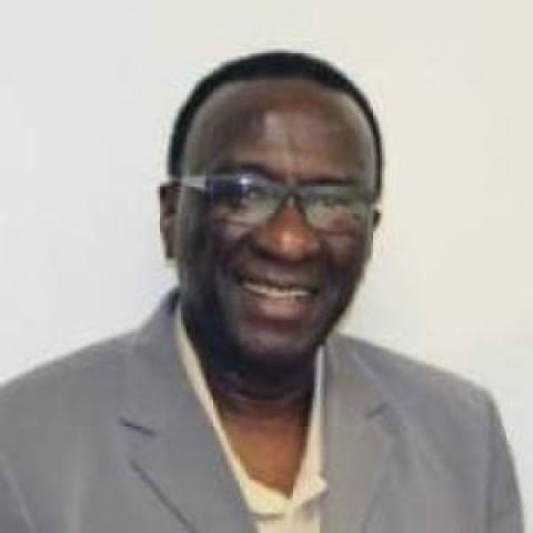 Profile headshot photo of Mbye Cham.