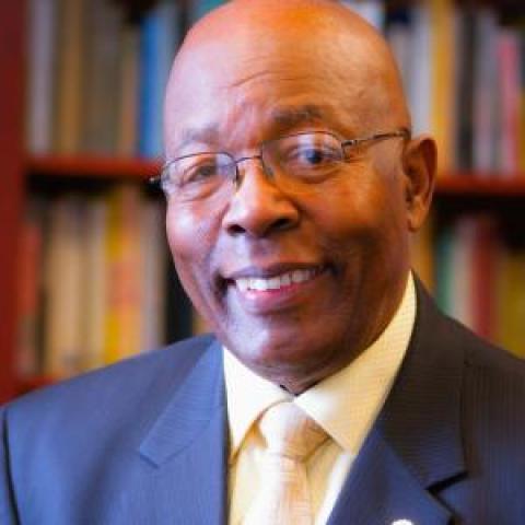 Profile headshot photo of Clarence Matthews Lee.