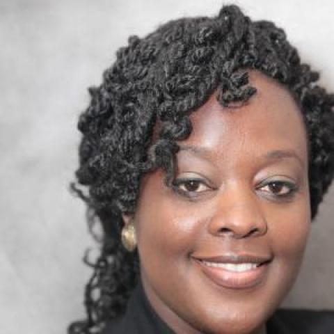 Profile headshot photo of Mary K Awuonda.