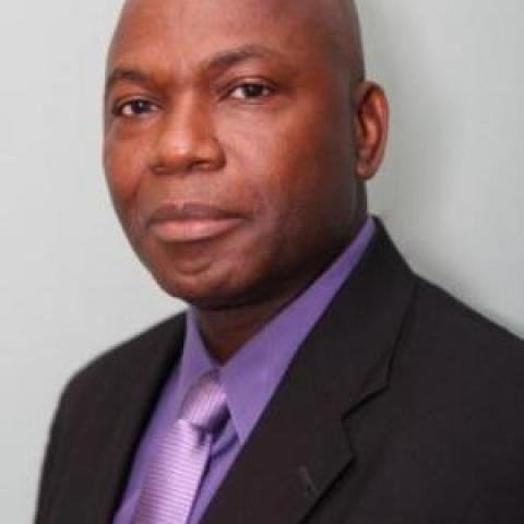 Profile headshot photo of Moses Garuba.