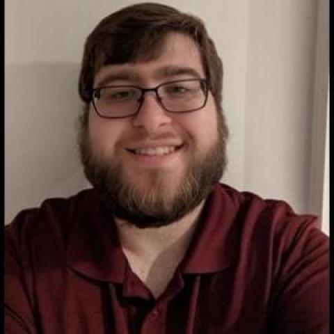 Profile headshot photo of Joshua Zellar.