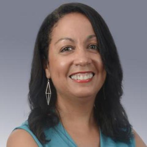 Profile headshot photo of Lynne Kelly.
