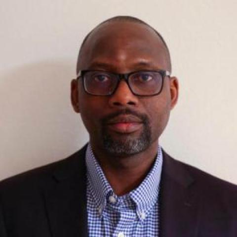 Profile headshot photo of Olumide Malomo.