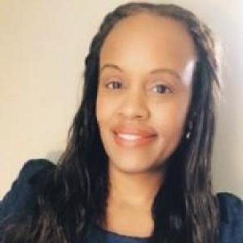 Profile headshot photo of Sheryl Neverson.
