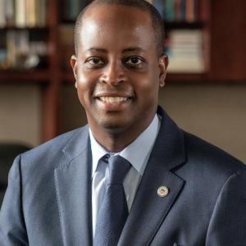 Profile headshot photo of Wayne A. I. Frederick.