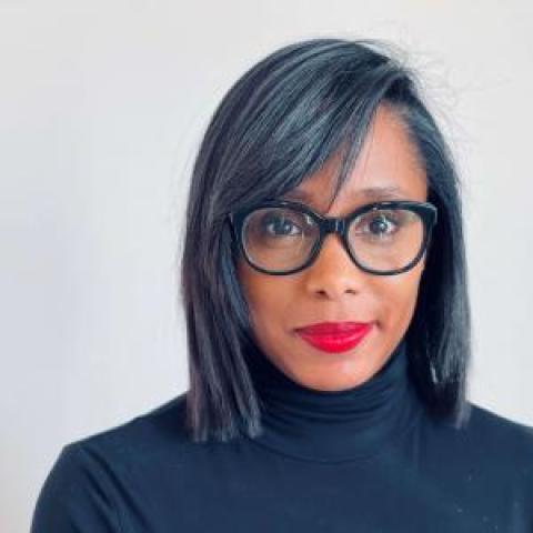 Profile headshot photo of Roxanne Caesar.