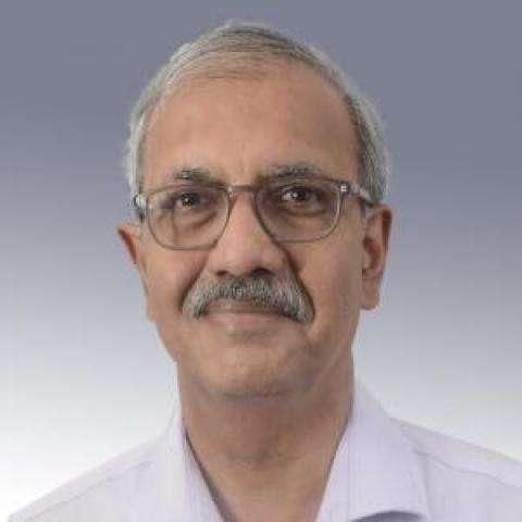 Profile headshot photo of Sandip Mukherji.