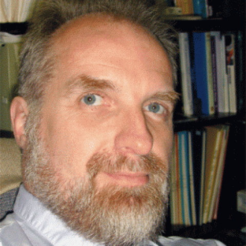 Profile headshot photo of Tristan Hubsch.