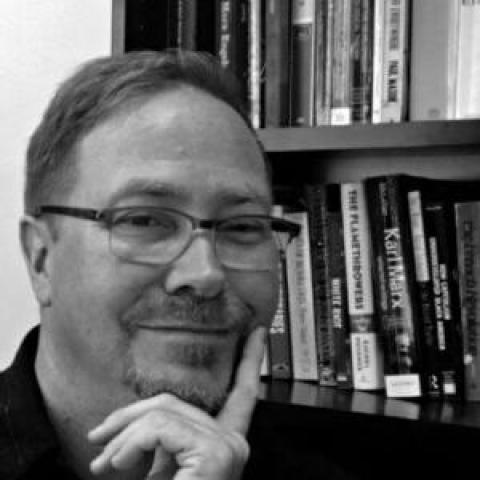 Profile headshot photo of Christopher Gunderson.