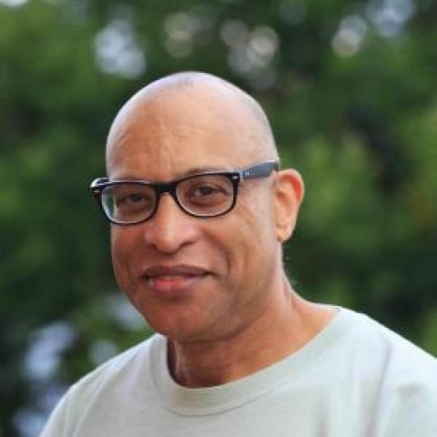 Profile headshot photo of Dennis Davenport.