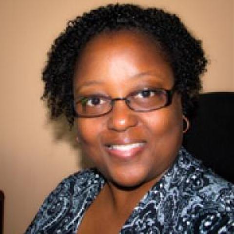 Profile headshot photo of Benita Gladney, DMA.