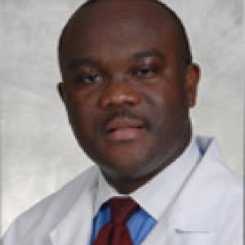 Profile headshot photo of Kakra Hughes, MD, PhD.
