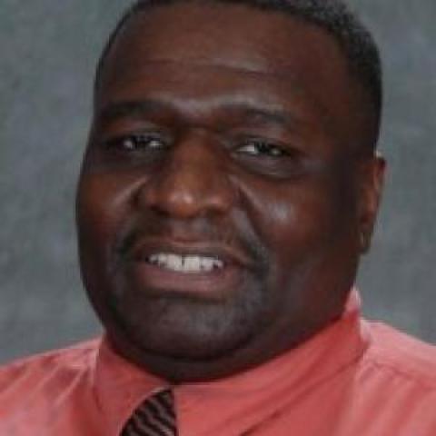Profile headshot photo of Marlon J. Prince.