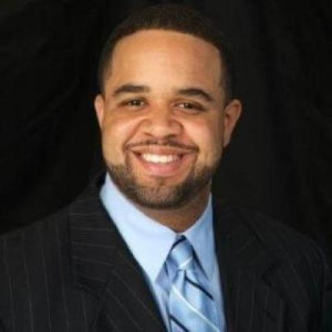 Profile headshot photo of Rashad Young.