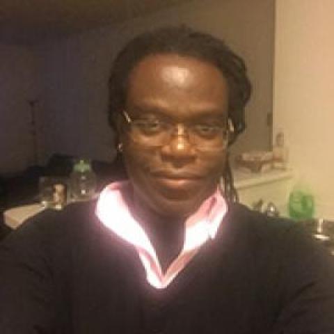 Profile headshot photo of Michael A Thomas.