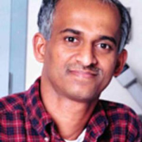 Profile headshot photo of Hemayet Ullah.