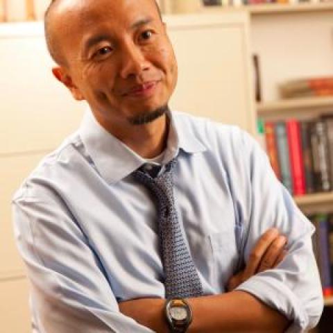 Profile headshot photo of Ezer Kang.