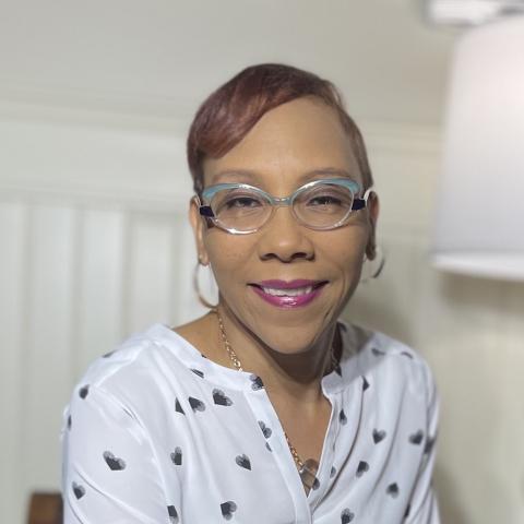 Profile headshot photo of Dionna Green.