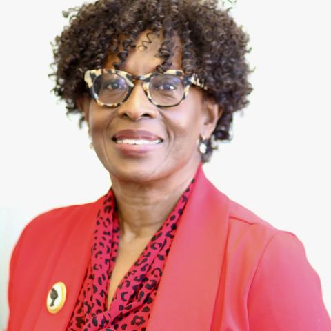 Profile headshot photo of Ingrid Sturgis, M.A..