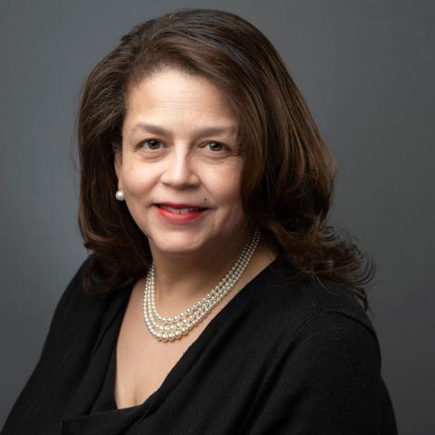 Profile headshot photo of Cheryl D. Miller, DHL, DFA.
