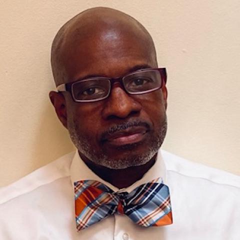 Profile headshot photo of Thomas Spann.