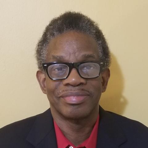 Profile headshot photo of Clarence Lusane.