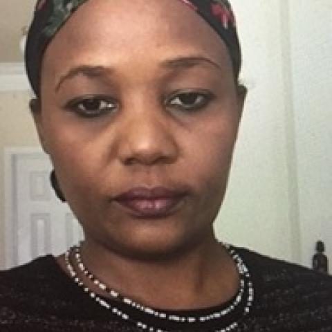 Profile headshot photo of Esther Mukewa Lisanza, PHD.
