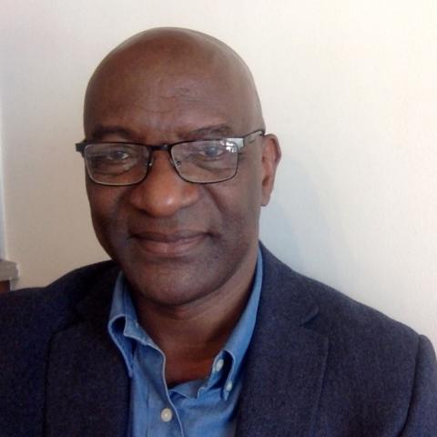 Profile headshot photo of Jean-Michel Mabeko-Tali.