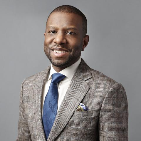 Profile headshot photo of Ivory Achebe Toldson.
