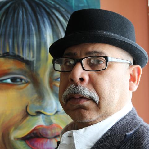 Profile headshot photo of Raul Ferrera-Balanquet, Ph.D..
