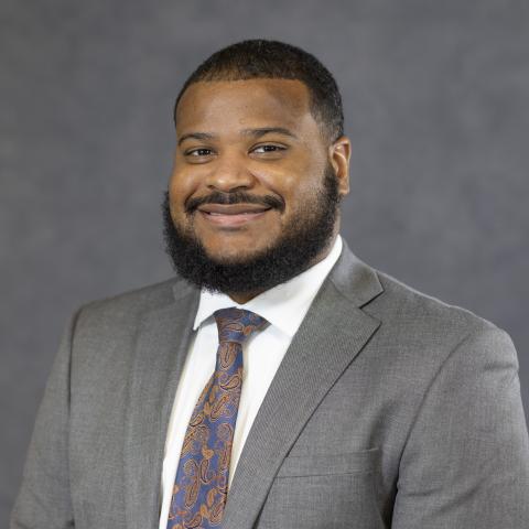Profile headshot photo of Kyron Carter, MBA.
