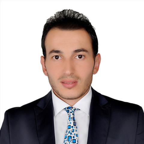 Profile headshot photo of Gentjan Saliu, MA.