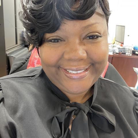 Profile headshot photo of Tiffany Harris.