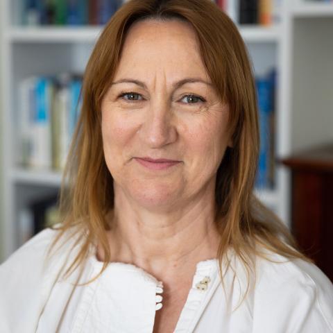 Profile headshot photo of Nina Gjoci, PHD.