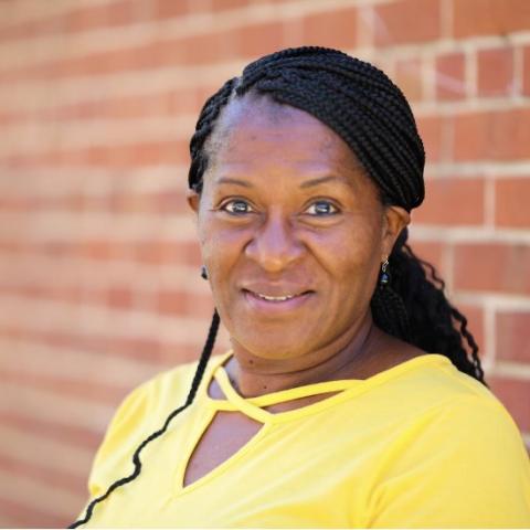 Profile headshot photo of Calena Smith.