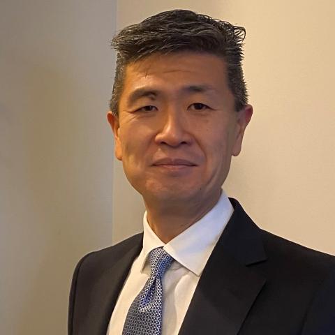 Profile headshot photo of John Ahn.