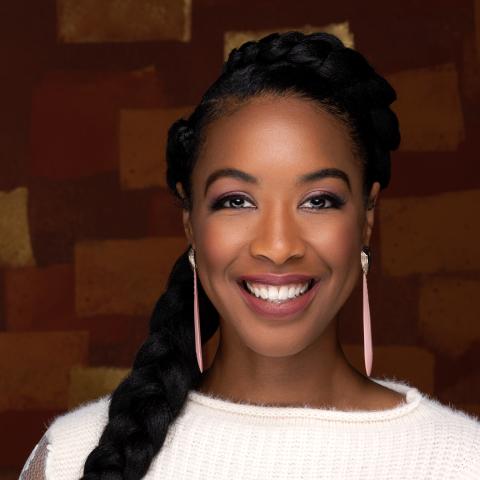 Profile headshot photo of Carolyn Malachi.