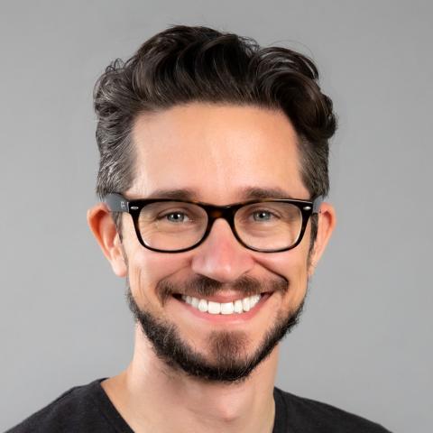 Profile headshot photo of William Kenlon, DMA.