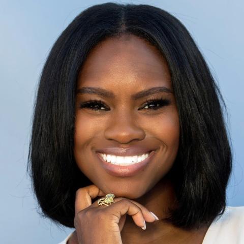 Profile headshot photo of MADISON MYRICK.