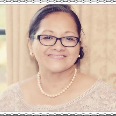 Profile headshot photo of Luisa Pisigan Gales.