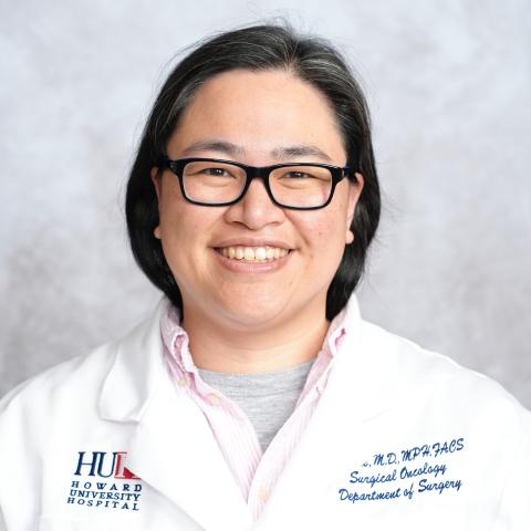 Profile headshot photo of May Tee, MD, MPH, FACS.