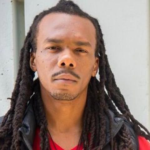 Profile headshot photo of Osi Ajoku, PhD.