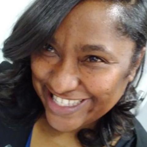 Profile headshot photo of Angela Hardiman.